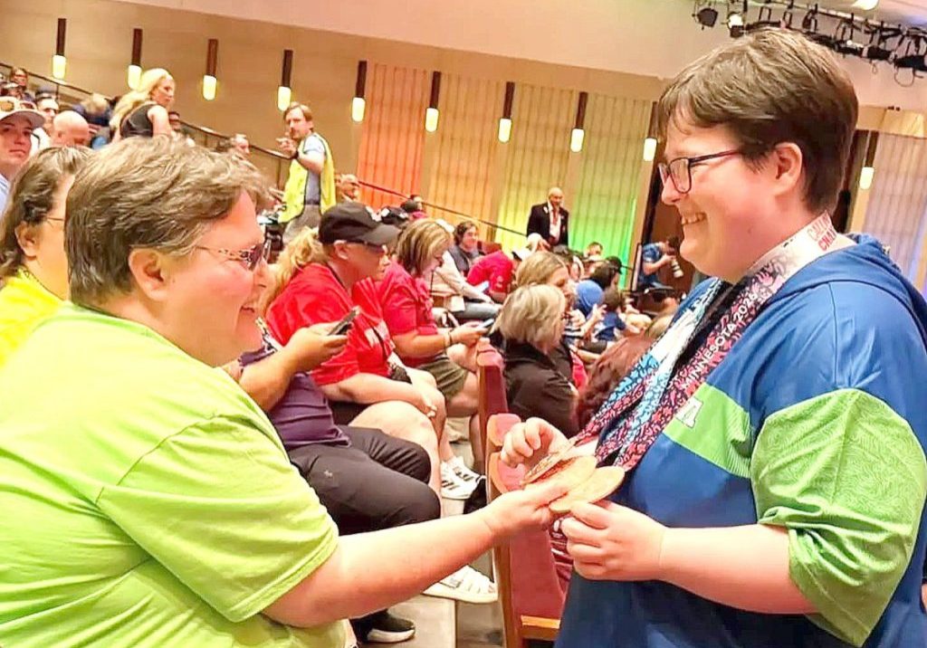 EM LAPLANT, right, shows her three medals to her mother, LIZ LAPLANT after an awards ceremony. (Submitted photo)